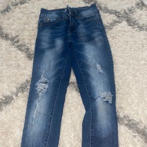 mid rise blue ripped jeans